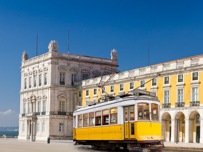 What to visit in Portugal, Tram in Lisbon in front of Praça do Comércio, Portugal